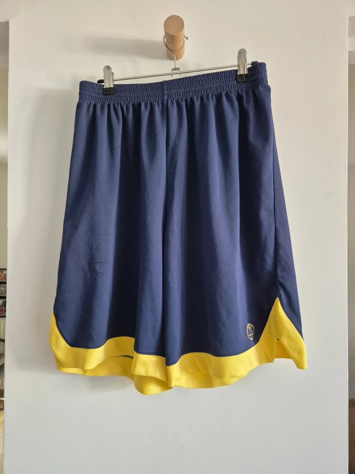 Short bleu et jaune décathlon S